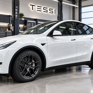 Borbet Y E-Grey 19 Zoll Komplettrad am weißen Tesla Model Y, Front-Seitenansicht